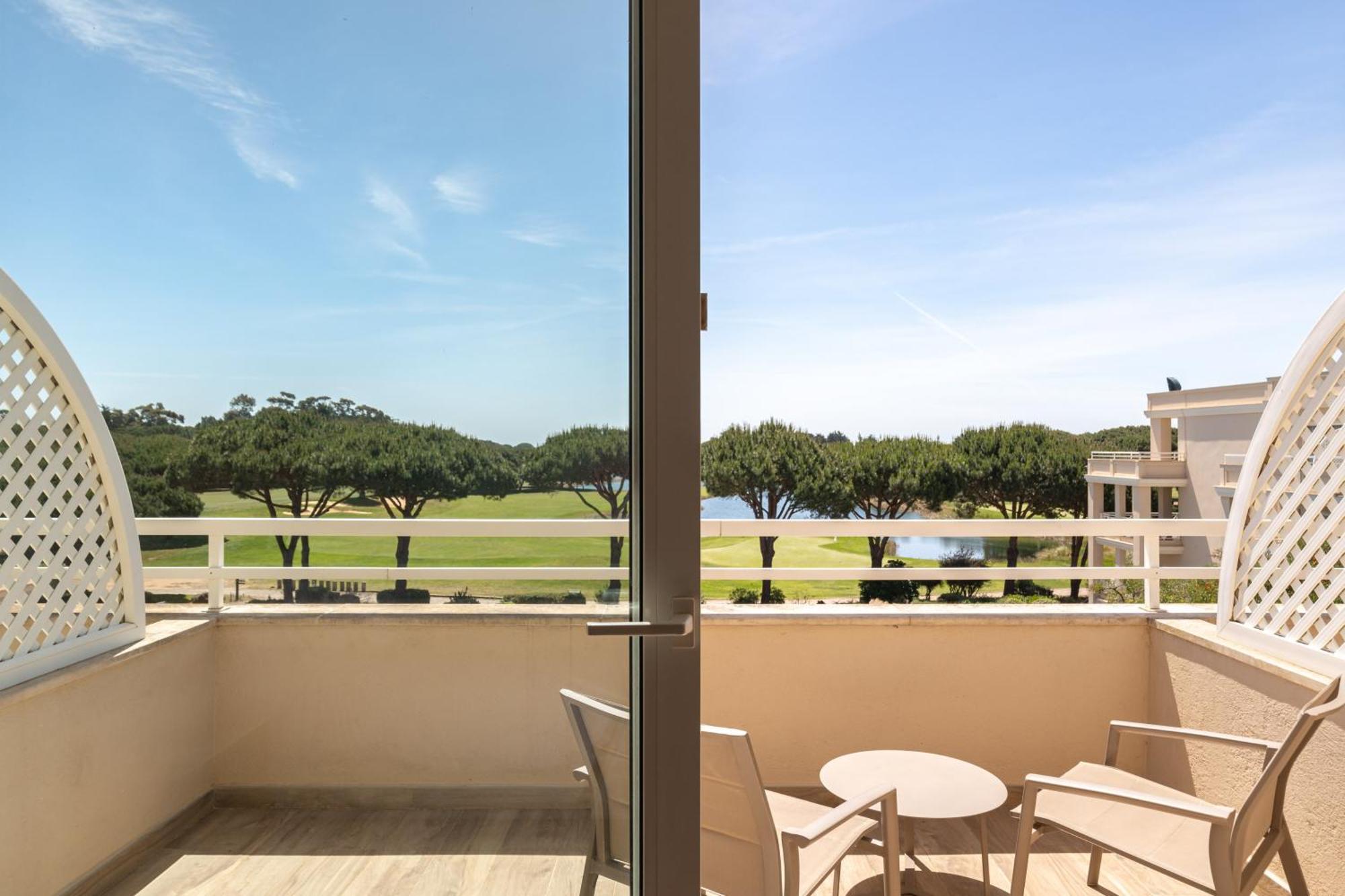 Onyria Quinta Da Marinha Hotel Cascais Esterno foto A view of the golf course from a guest room at The Inn at Palmetto Cove